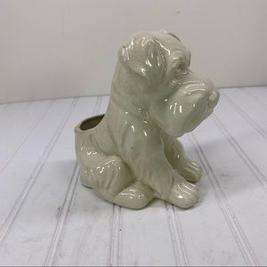 White ceramic dog planter